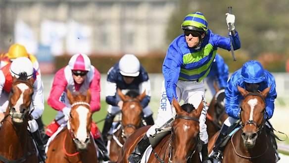  Nicholas Hall riding Jameka celebrates winning the 2016 Caulfield Cup on Saturday.
