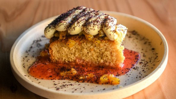 Brown butter cake with cream cheese frosting and fermented strawberry.