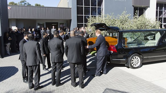 The coffin of Myuran Sukumaran is taken into church.