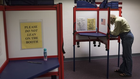 An early voter casts her ballot in Athens, Ohio.
