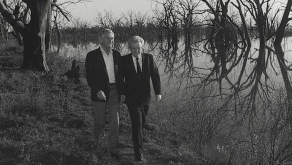 Winning formula: Bob Hawke and Graham Richardson walk among dead box trees at Disher Creek in Renmark South Australia.