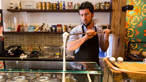 Harun Yalcin serving Turkish ice-cream at Cuppa Turca in Northcote.  