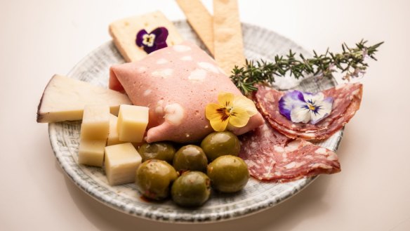 Antipasto for one, with mortadella-wrapped stracciatella (centre).