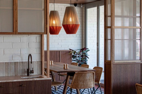 The cafe is broken into various nooks by timber joinery, making a large space feel smaller and warmer.