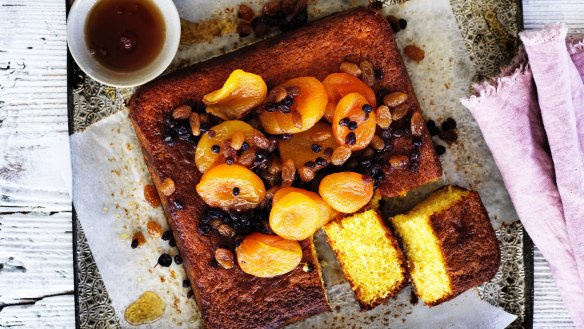 This fine-crumbed cake is fragrant with sweet dessert wine, and decorated with sticky autumn fruits.