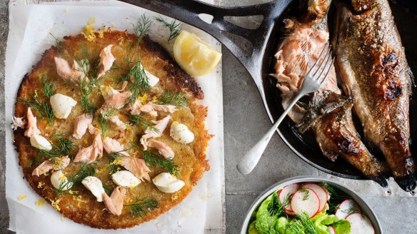 Crispy potato rosti topped with creme fraiche dollops, dill fronds and flaked trout.