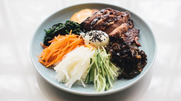 Beef short rib bibimbap - galbi short rib, rice, mixed vegetables, korean pickles, poached egg.