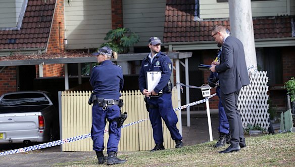 Police at a townhouse complex in Florida Street, Sylvania, where the body of a woman was found.
