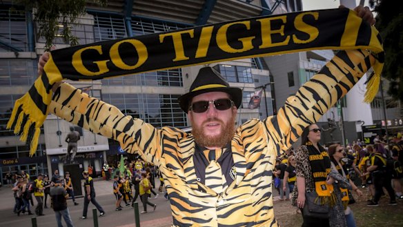 A fan shows where his loyalties lie on Saturday.