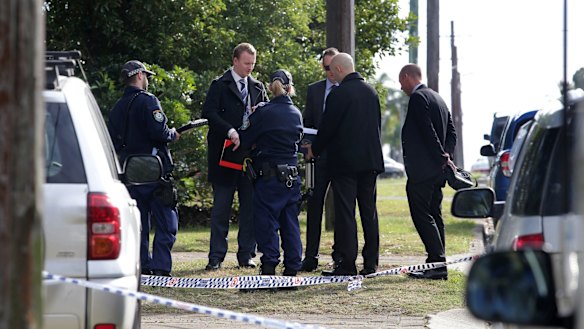 Police at a townhouse complex in Florida Street, Sylvania, where the body of a woman was found.