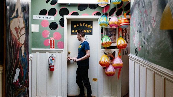 Grant Hummer outside his room at the Crypto Crackhouse in San Francisco.