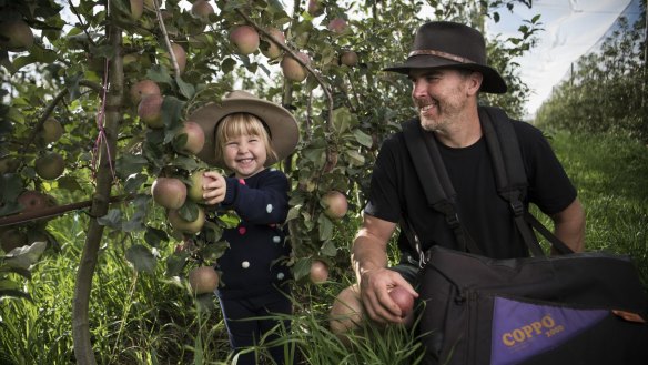 Sam Edwards and his daughter Grace of Logan Brae Orchards in Blackheath. 