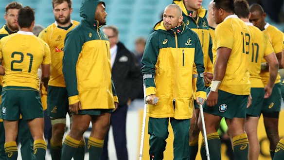 Miserable outing: Matt Giteau hobbled out of ANZ on crutches.