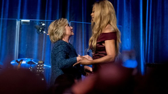 Hillary Clinton is welcomed to the stage by Laverne Cox at the LBGT For Hillary Gala in New York.