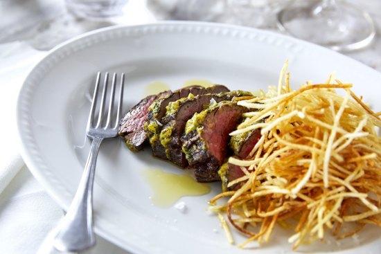 Steak frites with Cafe de Paris butter and pommes allumettes.