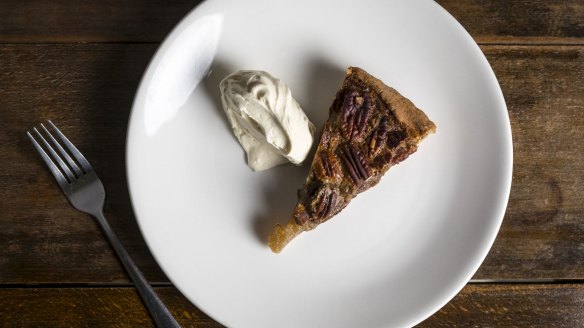 Pecan pie with whipped cream.