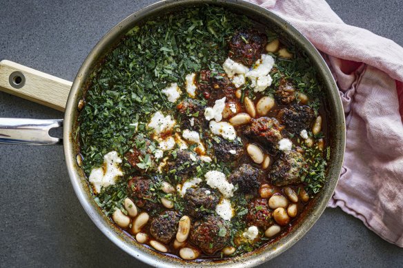 Meatball and white bean stew with creamy, melty feta.