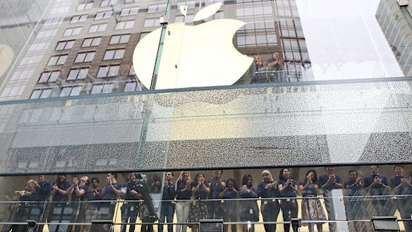 Staff at the Apple store in Sydney. Apple is one of many US multinationals that has been criticised for not paying enough tax in Australia. 