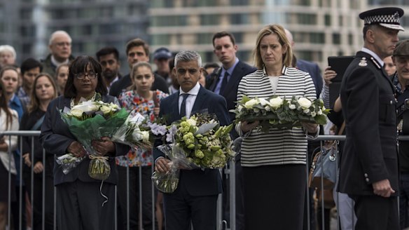 Shadow Home Secretary Diane Abbott, London mayor Sadiq Khan and Home Secretary Amber Rudd take part in a vigil for the victims of the London Bridge terror attacks in Potters Fields Park.