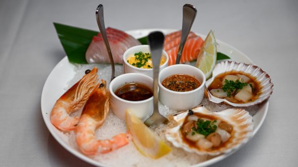 The four dances of the sea: kingfish and trout sashimi; marinated scallops; and razorback prawns.