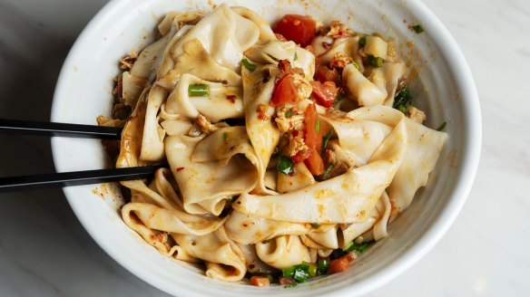 The signature noodles topped with chilli.