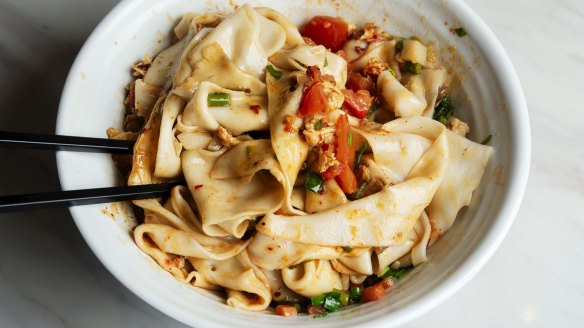 The signature noodles topped with chilli.