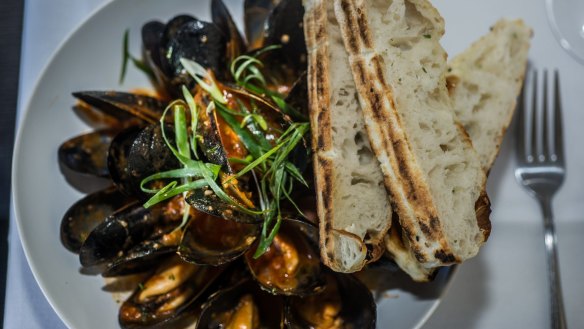 Mussels in red sauce - mop up the tomato sauce with house-baked bread.