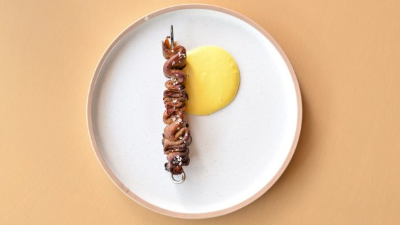 Veal tongue kebab with aji amarillo mayo.