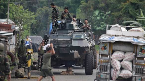 Soldiers prepare for deployment on the outskirts of Marawi city, southern Philippines. 