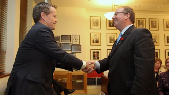 Happier times: Opposition Leader Bill Shorten congratulates David Feeney at the Labor caucus.  