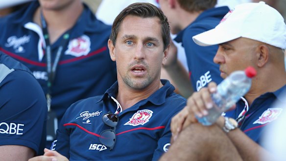 Serving his suspension: Mitchell Pearce watches a Roosters game during his ban earlier in the season.