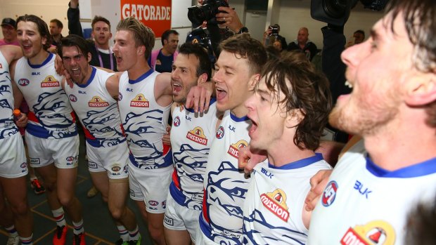 The Bulldogs sing the club song after making some history in their win over West Coast. 