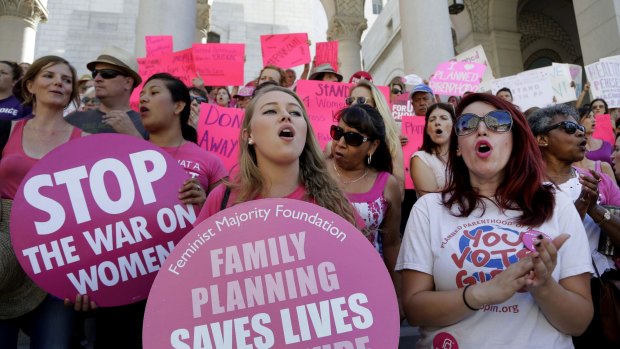 Planned Parenthood supporters attend a rally in Los Angeles last year to campaign for access to reproductive health care.