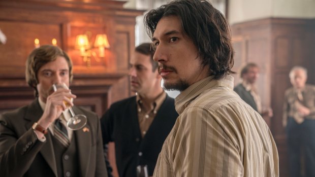 Topher Grace, left, and Adam Driver, right, in a scene from BlacKkKlansman.