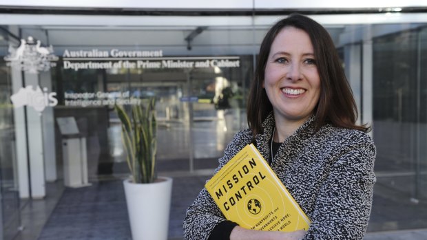 Liana Downey, a strategic adviser for not-for-profit organisations, with her book Mission Control.
