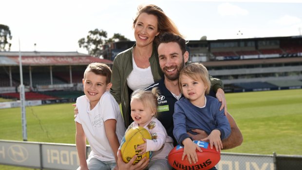 Retiring Blues veteran Andrew Walker with wife Kylie and children Cody, Arli and Leti.