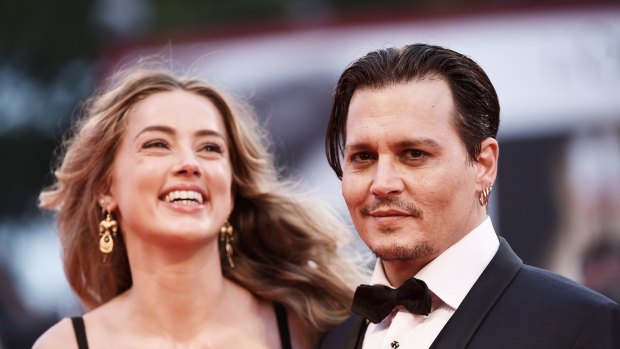 Johnny Depp and Amber Heard at the premiere of Black Mass at the Venice Film Festival.