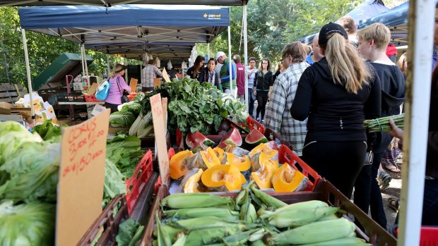 Crowds flock to the weekly Davies Park farmers market in West End.
