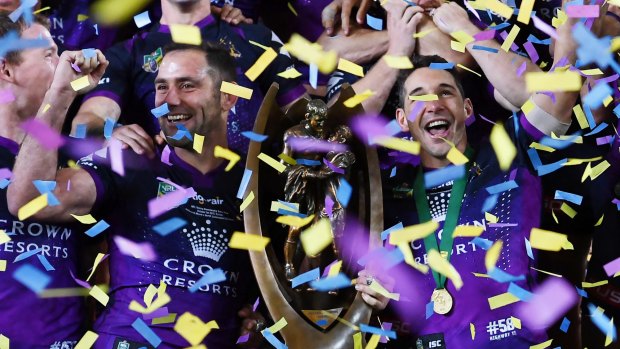 Melbourne Storm stars Cameron Smith and Billy Slater with the 2017 NRL Premiership Trophy.