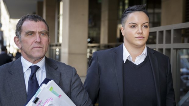 Shadi Kazeme (right) leaves the Melbourne Magistrates Court on Friday.