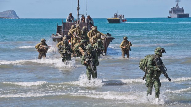Australian and Singapore soldiers take part in an exercise at Shoalwater Bay.