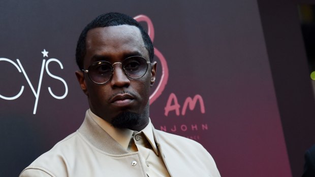 Sean "Diddy" Combs denies being the aggressor in a violent confrontation with his son's football coach.