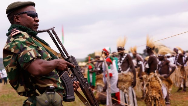 Soldiers on guard as President Pierre Nkurunziza kicks off his official campaign for the presidency at a rally on Thursday  in Busoni, Burundi. 