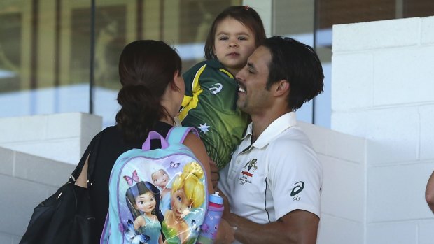Time to pack: Mitchell Johnson with his daughter Rubika and wife Jessica at the WACA.