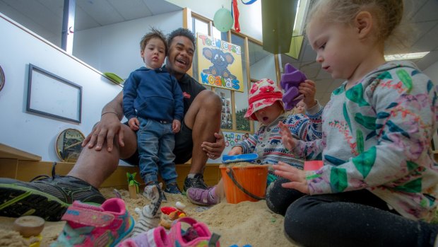 Gungahlin Eagles rugby player Pat Tuidraki at his day job as a childcare worker.