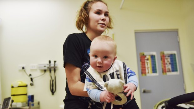 Kiara Bloxsome and her six-month-old son Carter, whose family have been patients of the Mount Druitt Aboriginal Medical Service for four generations. "The GPs understand where you come from, because they come from the same background," Ms Bloxsome said.