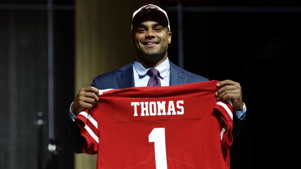 No.1: Stanford University star Solomon Thomas poses after being selected by the San Francisco 49ers.