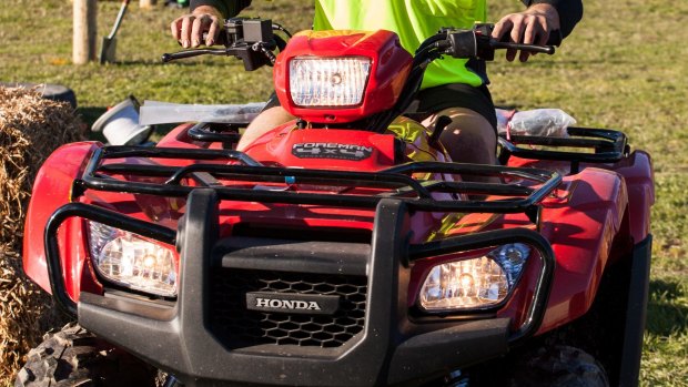 A Brisbane man was injured loading quad bike onto ute.