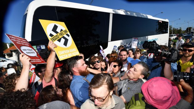 Anti-racist activists stop Q Society members boarding a bus at St Kilda Marina.