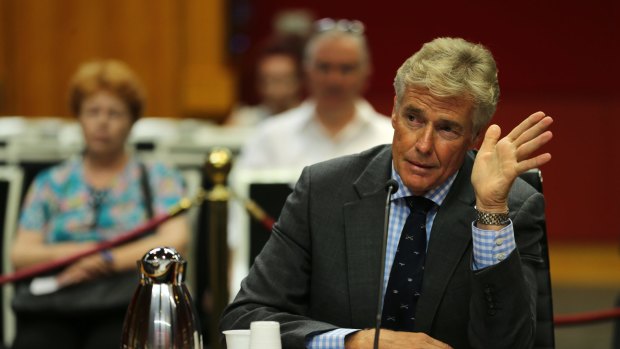 Former MP Tim Owen answers questions at the NSW Parliament inquiry.